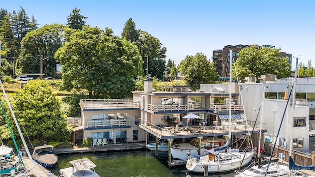 2900 Westlake Ave N, Seattle, WA 98109 - dock featuring a water view and view of wooded area
