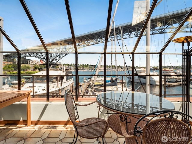 2900 Westlake Ave N, Seattle, WA 98109 - view of patio / terrace with a water view and a dock