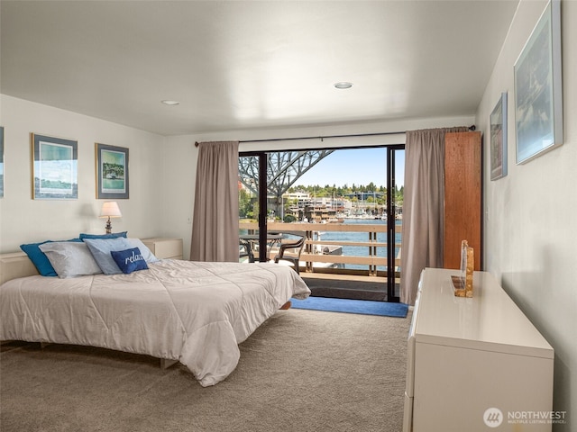 2900 Westlake Ave N, Seattle, WA 98109 - carpeted bedroom featuring a water view, access to exterior, and recessed lighting