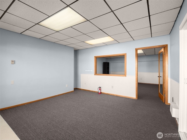 2900 Westlake Ave N, Seattle, WA 98109 - basement with carpet flooring, a drop ceiling, and baseboards