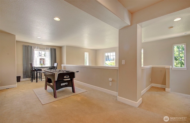 15202 NE 102nd Way, Vancouver, WA 98685 - recreation room with carpet flooring, plenty of natural light, a textured ceiling, and recessed lighting