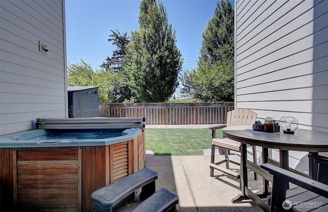 15202 NE 102nd Way, Vancouver, WA 98685 - fenced backyard featuring a hot tub, a patio, and a storage shed