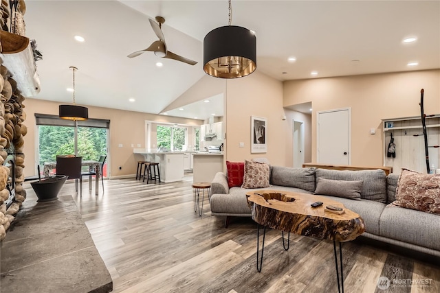 7547 NE 200 NE, Kenmore, WA 98028 - living room featuring light wood-style flooring, ceiling fan, high vaulted ceiling, and recessed lighting