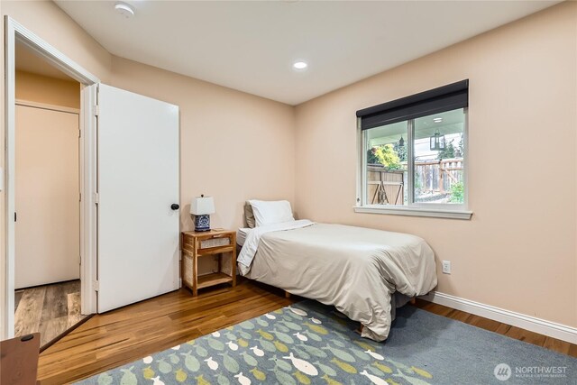 7547 NE 200 NE, Kenmore, WA 98028 - bedroom with wood finished floors, baseboards, and recessed lighting