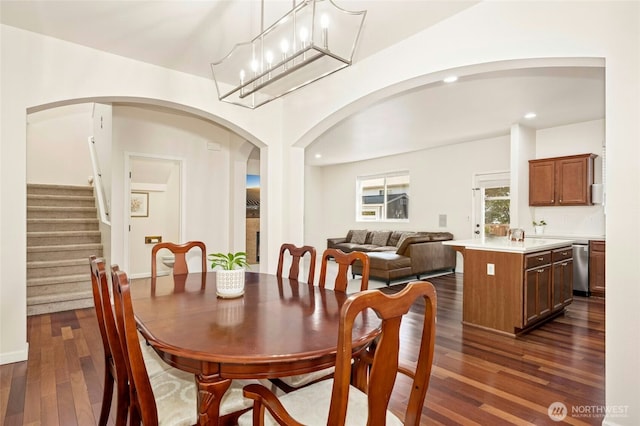 4915 NE 5th St, Renton, WA 98059 - dining room with dark wood-style flooring, arched walkways, recessed lighting, and stairway