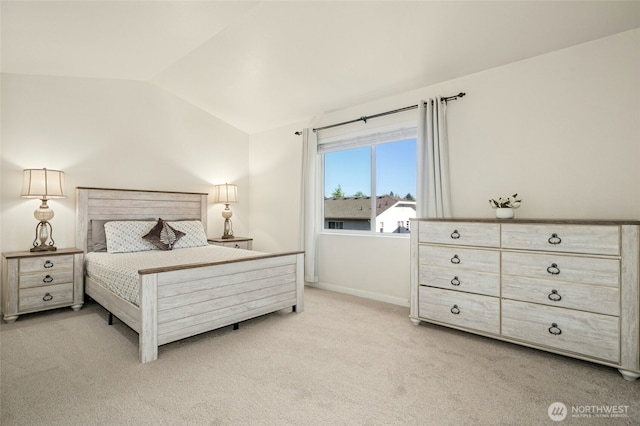 4915 NE 5th St, Renton, WA 98059 - bedroom featuring lofted ceiling and carpet flooring