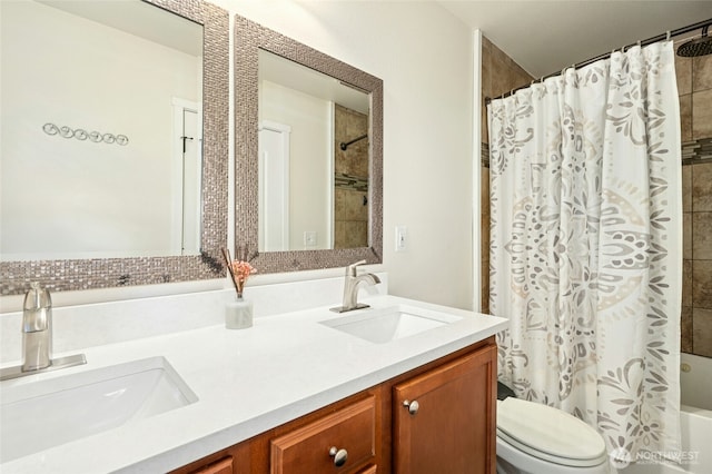 4915 NE 5th St, Renton, WA 98059 - full bathroom with double vanity, toilet, and shower / tub combo with curtain