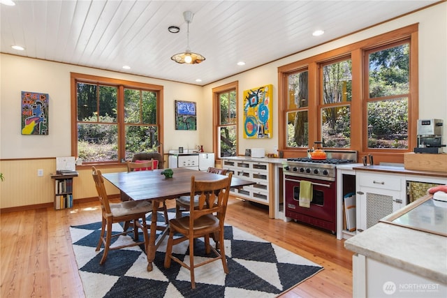 3422 Copper St, Port Townsend, WA 98368 - dining space featuring wainscoting, wood ceiling, light wood-style floors, and recessed lighting