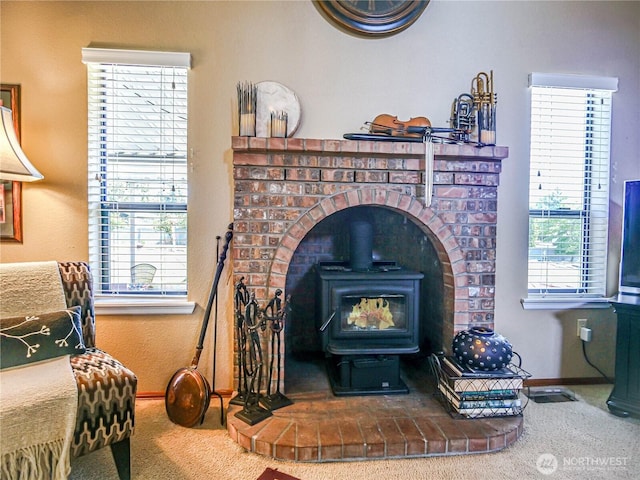 4425 65th St E, Tacoma, WA 98443 - detailed view of a wood stove and carpet flooring
