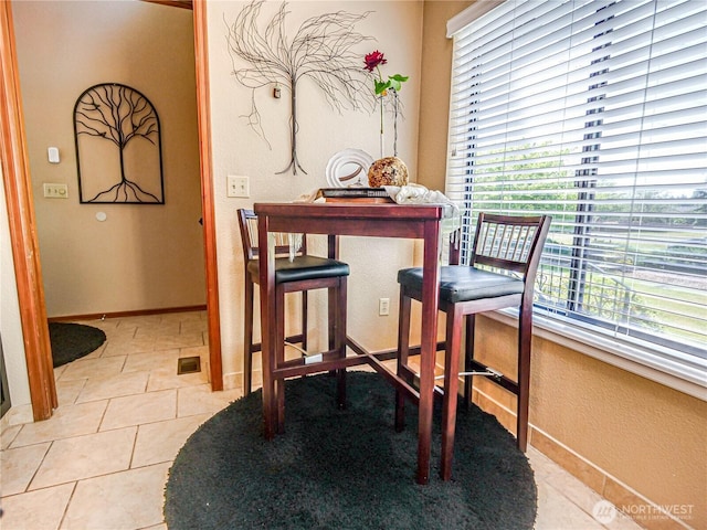 4425 65th St E, Tacoma, WA 98443 - dining area featuring light tile patterned floors and baseboards