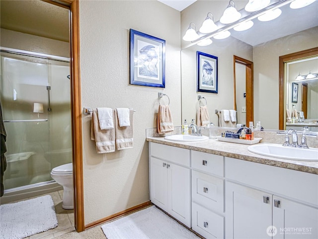 4425 65th St E, Tacoma, WA 98443 - full bath with double vanity, a stall shower, and a textured wall