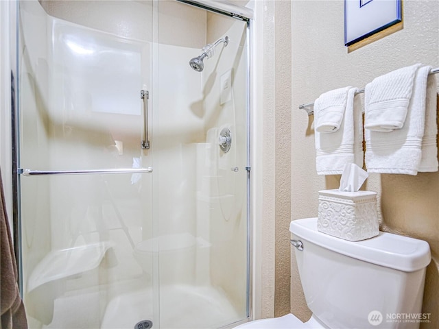 4425 65th St E, Tacoma, WA 98443 - bathroom with a textured wall and a stall shower