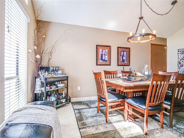 4425 65th St E, Tacoma, WA 98443 - dining area featuring a chandelier, lofted ceiling, and tile patterned flooring