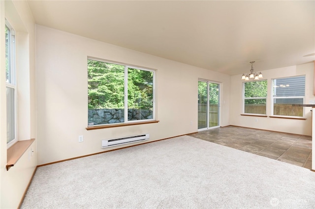 2413 106th Dr SE, Lake Stevens, WA 98258 - carpeted empty room with baseboard heating, a chandelier, healthy amount of natural light, and baseboards