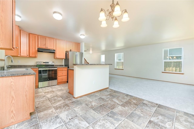 2413 106th Dr SE, Lake Stevens, WA 98258 - kitchen featuring stainless steel appliances, a sink, under cabinet range hood, light colored carpet, and a chandelier