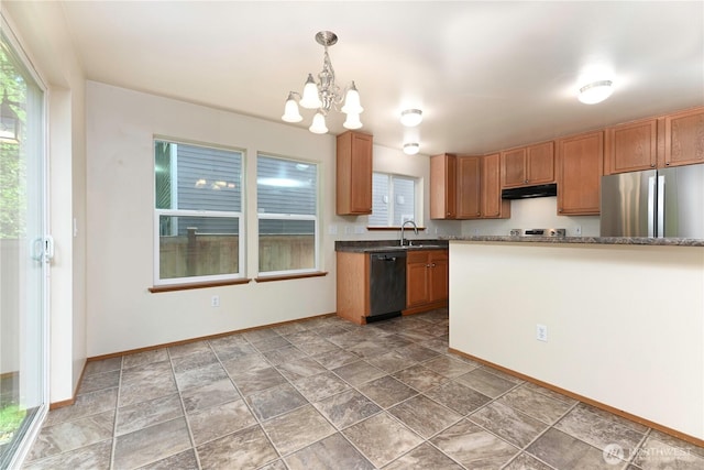 2413 106th Dr SE, Lake Stevens, WA 98258 - kitchen featuring freestanding refrigerator, dishwashing machine, under cabinet range hood, baseboards, and plenty of natural light