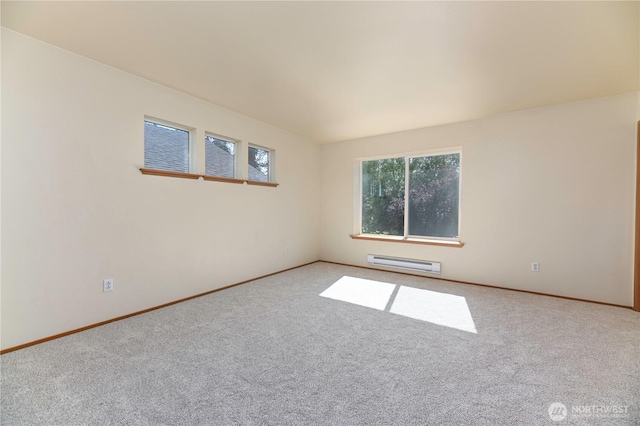 2413 106th Dr SE, Lake Stevens, WA 98258 - carpeted spare room featuring a baseboard radiator and baseboards