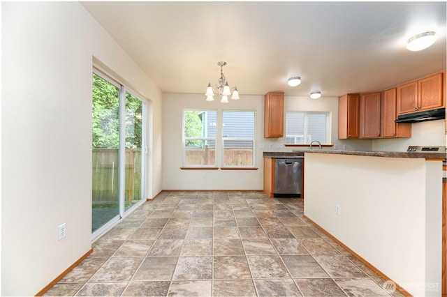 2413 106th Dr SE, Lake Stevens, WA 98258 - kitchen with dishwasher, under cabinet range hood, baseboards, dark countertops, and a chandelier