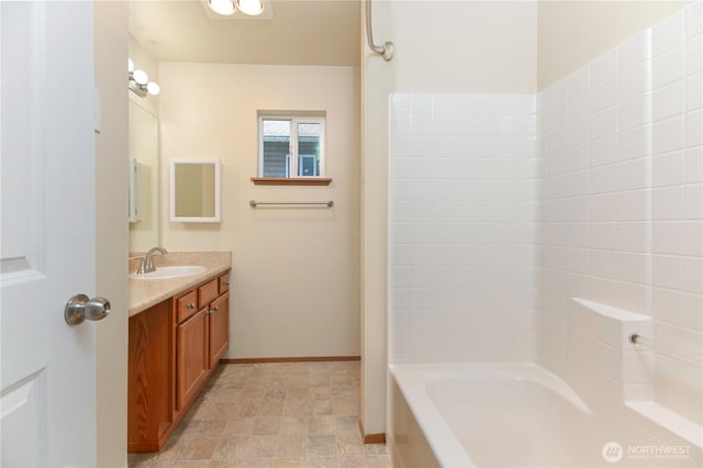 2413 106th Dr SE, Lake Stevens, WA 98258 - full bath featuring vanity, bathing tub / shower combination, and baseboards
