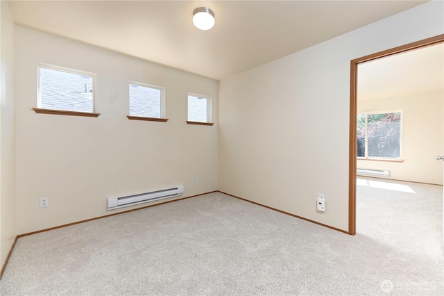 2413 106th Dr SE, Lake Stevens, WA 98258 - empty room with a baseboard heating unit, carpet floors, baseboards, and baseboard heating