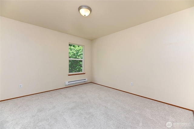 2413 106th Dr SE, Lake Stevens, WA 98258 - unfurnished room with a baseboard radiator, light carpet, and baseboards