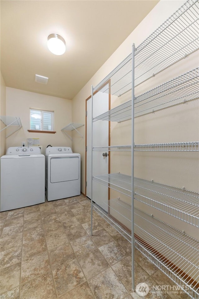 2413 106th Dr SE, Lake Stevens, WA 98258 - laundry room featuring separate washer and dryer