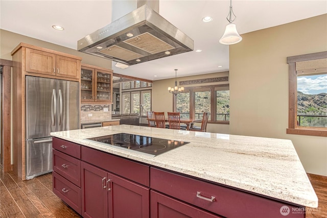 24386 US Highway 97, Chelan, WA 98816 - kitchen featuring freestanding refrigerator, island range hood, black electric cooktop, dark wood finished floors, and a chandelier
