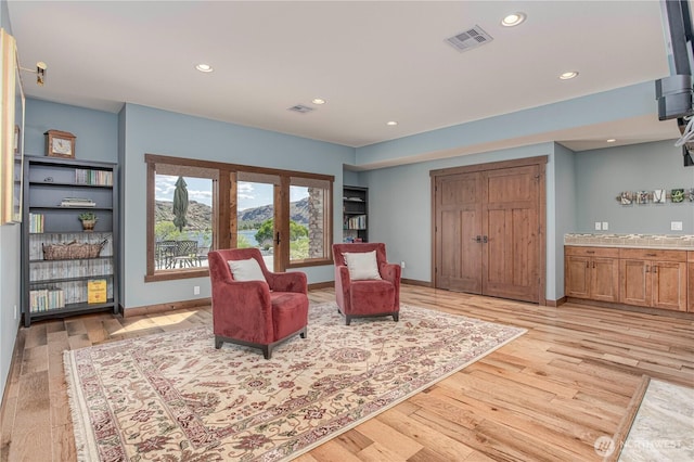 24386 US Highway 97, Chelan, WA 98816 - living area with light wood finished floors, recessed lighting, and baseboards