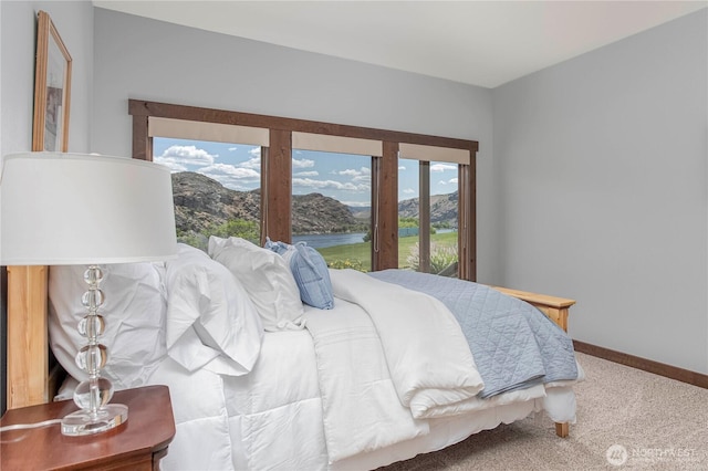 24386 US Highway 97, Chelan, WA 98816 - bedroom with carpet floors, baseboards, and a mountain view
