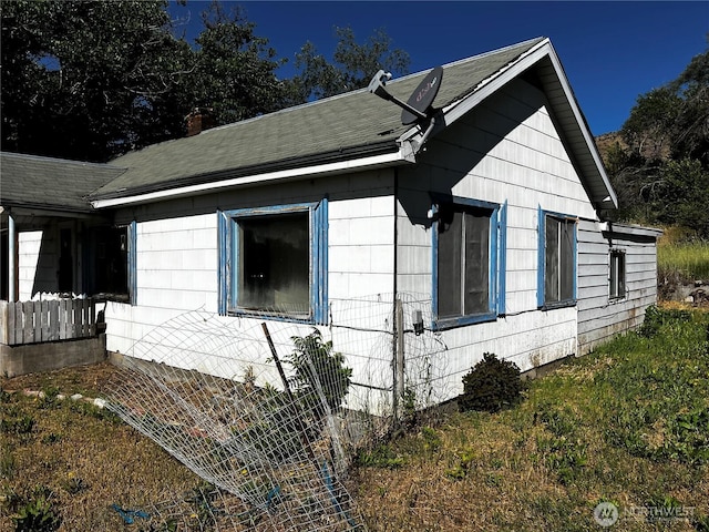 2405 Elmway, Okanogan, WA 98840 - view of home's exterior featuring roof with shingles