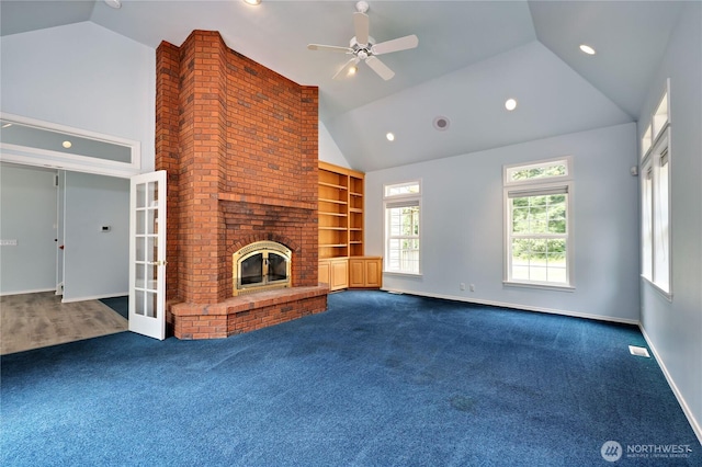 2800 Cliff St, Port Townsend, WA 98368 - unfurnished living room featuring dark colored carpet, healthy amount of natural light, ceiling fan, recessed lighting, and high vaulted ceiling