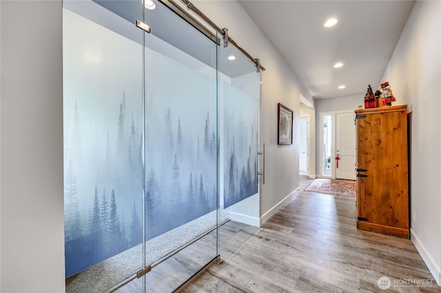 4689 Petrel St, Port Townsend, WA 98368 - hallway with wood finished floors and recessed lighting