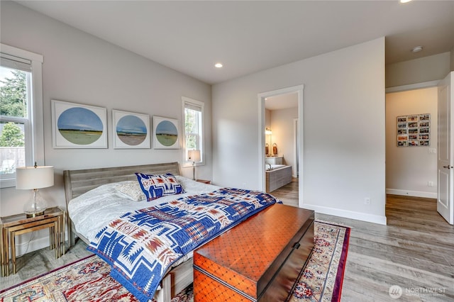 4689 Petrel St, Port Townsend, WA 98368 - bedroom with wood finished floors, recessed lighting, and ensuite bath