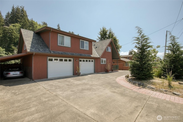1211 E Market St, Aberdeen, WA 98520 - view of property exterior featuring concrete driveway and a shingled roof