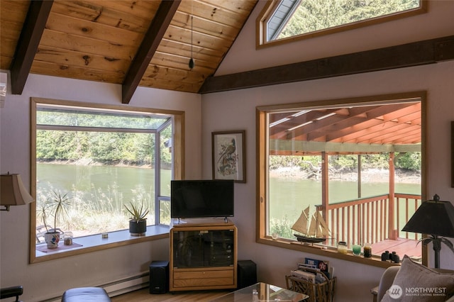 1211 E Market St, Aberdeen, WA 98520 - living room featuring wooden ceiling, plenty of natural light, a baseboard heating unit, and wood finished floors