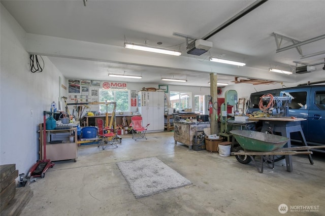 1211 E Market St, Aberdeen, WA 98520 - garage with a workshop area and a garage door opener