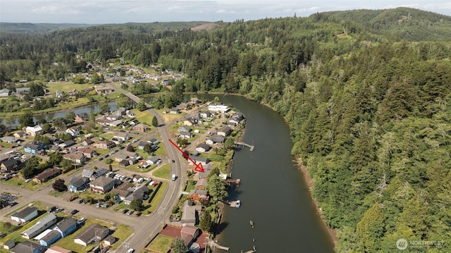 1211 E Market St, Aberdeen, WA 98520 - aerial overview of property's location featuring a forest, a large body of water, and nearby suburban area
