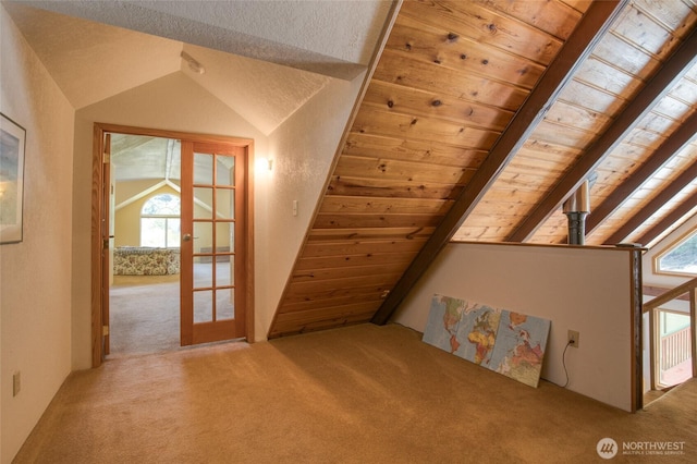 1211 E Market St, Aberdeen, WA 98520 - additional living space with carpet, vaulted ceiling, and french doors