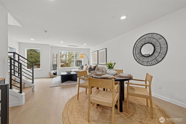 11232 Corliss Ave N, Seattle, WA 98133 - dining room with light wood-style floors, stairs, and recessed lighting
