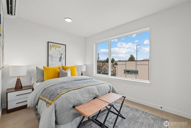 11232 Corliss Ave N, Seattle, WA 98133 - bedroom featuring baseboards and light wood-type flooring