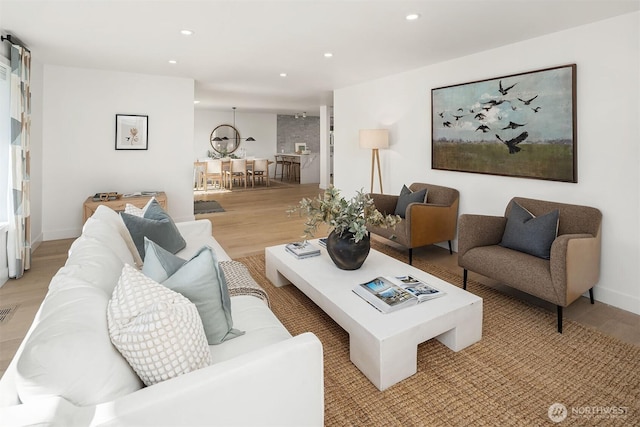 1910 Edgemont Pl W, Seattle, WA 98199 - living room featuring light wood finished floors and recessed lighting