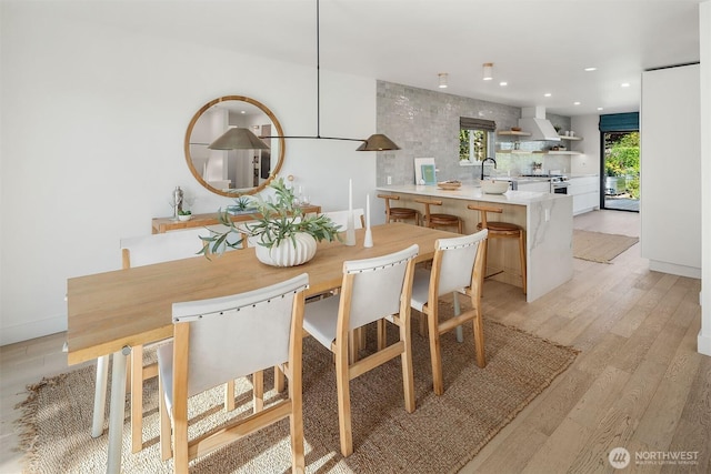 1910 Edgemont Pl W, Seattle, WA 98199 - dining area featuring light wood-type flooring and recessed lighting