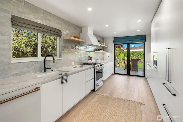 1910 Edgemont Pl W, Seattle, WA 98199 - kitchen with white appliances, open shelves, custom exhaust hood, modern cabinets, and white cabinetry