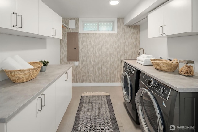 1910 Edgemont Pl W, Seattle, WA 98199 - washroom featuring washing machine and dryer, cabinet space, and electric panel