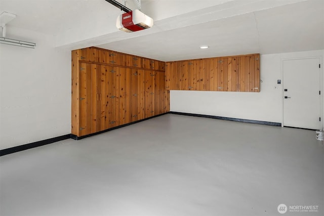 1910 Edgemont Pl W, Seattle, WA 98199 - garage featuring a garage door opener and recessed lighting