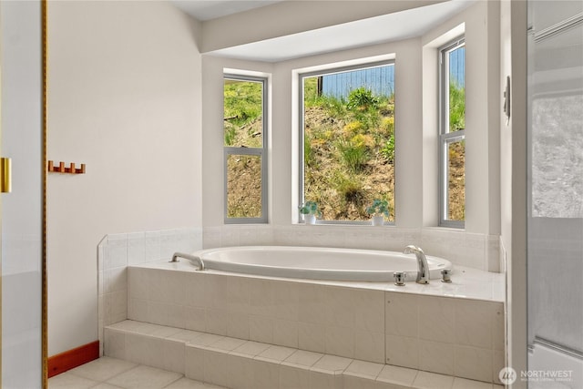 427 Rendezvous Rd, Winthrop, WA 98862 - bathroom featuring a garden tub and tile patterned floors
