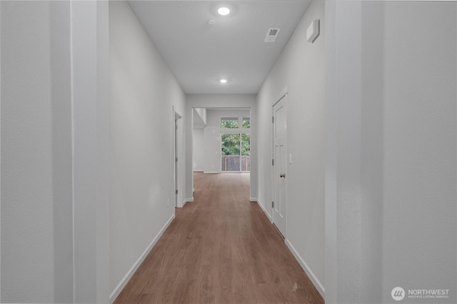 2605 S 7th Way, Ridgefield, WA 98642 - hall featuring baseboards, wood finished floors, and recessed lighting