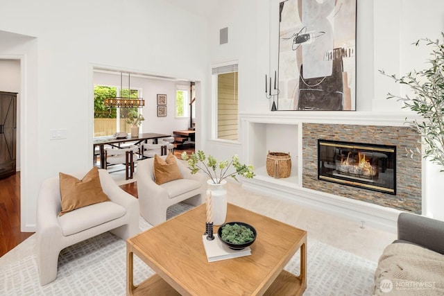 4213 249th Ct SE, Sammamish, WA 98029 - living area featuring a fireplace and wood finished floors