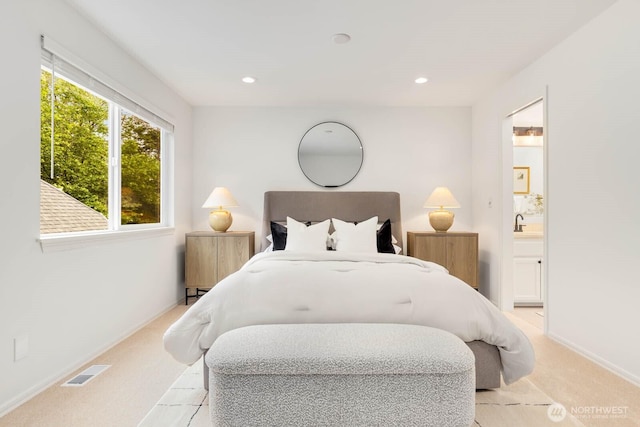 4213 249th Ct SE, Sammamish, WA 98029 - bedroom with light colored carpet, recessed lighting, and ensuite bathroom