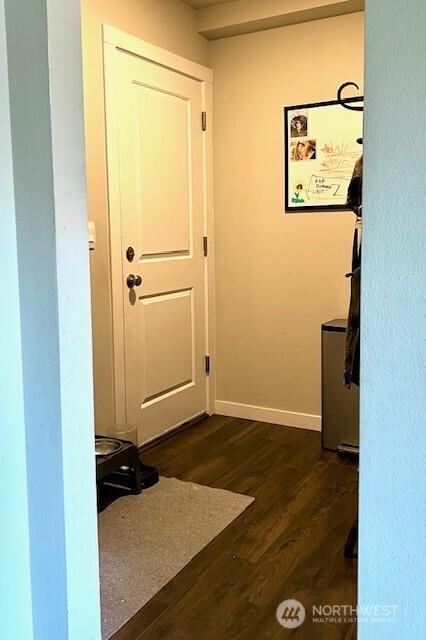 1342 Cascade St, Sultan, WA 98294 - hallway with dark wood finished floors and baseboards